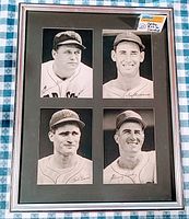 Framed set of four black and white vintage baseball player photos of Boston Red Sox players in uniform, arranged in a 2 by 2 grid inside a silver frame with a black mat.