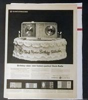 Full front view of the vintage General Electric LIFE magazine advertisement page showing a GE clock radio styled like a birthday cake with candles and headline text.