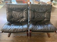 Front view of both chairs on hardwood floor
