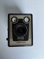 Front view of the Kodak Brownie Six-20 Model D camera showing lens, viewfinder windows and branding.