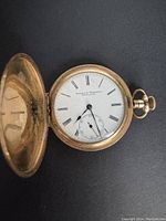 Front cover open showing dial