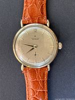 Front view of dial and hands