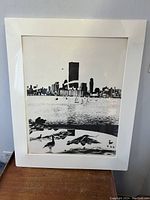 Front view of matted black and white print showing Toronto skyline, shrink wrapped