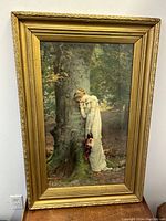 Front view of the gilt frame and lithograph showing overall appearance and condition