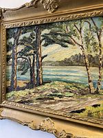 Close-up of the lower right corner of the painting showing the signature 'Mildred Mulligan July 1952,' impasto texture, and parts of the painting's lakeside scene.