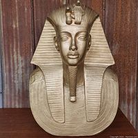 Front view of large Egyptian Pharaoh bust showing detailed headdress and cobra symbol in gold finish.