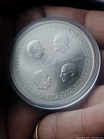 Obverse side showing four Canadian Governors General heads with names and dates