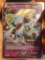 Full view of the Galarian Rainbow Rapidash V promo Pokémon trading card showing full art holographic design.