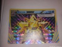 Front photo of Starmie BREAK Holo Foil Pokemon Card showing holographic foil pattern and card artwork.