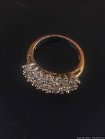 Top view of the silver plated cluster ring showing the arrangement of clear stones