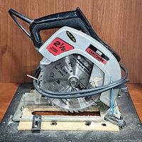 Close-up of Sears Craftsman vintage circular saw showing blade and brand labels.