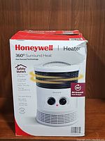 Box of Honeywell Heater with product features and branding.