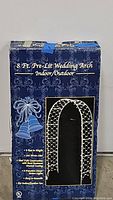 Front of box showing product name, features, and image of the wedding arch.
