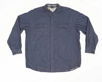 Front view of navy blue flannel lined shirt with button closures and two chest pockets.