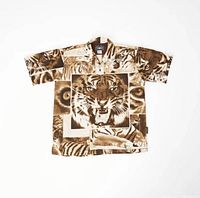 Front view of vintage short sleeve shirt with tiger faces in sepia tones and button closure.