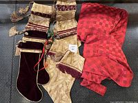 Overview of all stockings, seat covers, and bell in the lot.