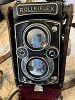 Front of camera showing Rolleiflex nameplate and twin lenses