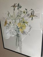 Original signed watercolor of floral arrangement in transparent vase with yellow flowers in black frame