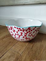 Side view showing the bowl's floral pattern and shape.