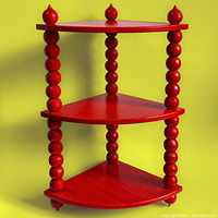 Front view of red corner shelf with three triangular shelves and four spindle legs with finials on top.