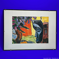 Framed abstract colourful print showing the full frame and artwork with a blue background.