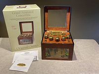 Front view of concertina box with original packaging and manuals