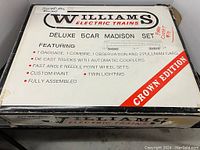 Original cardboard box for Williams Electric Trains Deluxe 5-car Madison Set with product features and crown edition label.