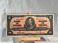 Front side of 1937 Canadian two dollar bill showing King George VI and serial number X0444603.