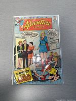 Front cover of Adventure Comics #396 featuring Supergirl and the story 'The Mystery of the Super-Orphan', showing characters at Smallville Orphanage.