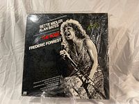 Front cover of Bette Midler The Rose vinyl record album featuring Bette Midler singing, showing album title and performers.