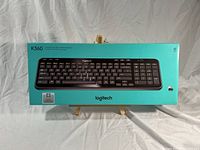 Front view of Logitech K360 wireless keyboard box showing product image and branding.