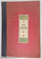 Red portfolio cover with black spine and decorative label with title 'Eight New Remington Paintings'