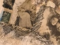 Close-up showing intricate textures, layered vintage photos of people, paint smudges, and fabric-like elements in sepia and brown tones.