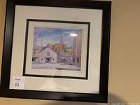 Framed limited edition print by A.J. Casson titled 'The Blacksmith Shop'.