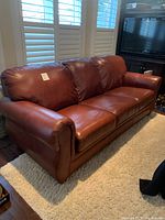 Full three-seat sofa showing overall condition and color