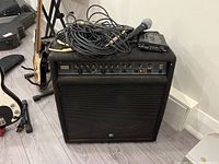 Front view of Yorkville Sound 200KB amplifier showing speaker grille, control panel with four channels and knobs