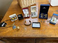 Group shot of all jewelry items displayed on table