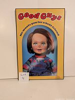 Front view of Chucky Good Guys doll mini poster with yellow background and red text