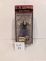 Front view of new Eowyn action figure in sealed original packaging with Lot 28 sign.