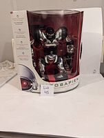 Robosapien robot toy in original unopened box showing full front view of packaging and robot inside.