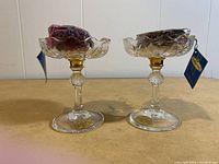 Two Killarney Crystal potpourri stands with dried potpourri on top, showing gold accents and original branding tags and stickers.