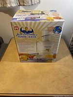 Box front showing product name, images, and claims of up to 30% more juice