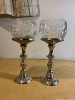Pair of two royal irish crystal mantel stands with pewter bases and cut crystal rose bowls, 5 inches tall