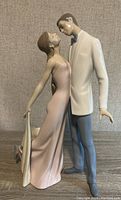 Front view of porcelain figurine showing couple facing forward