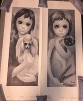 Both Walter Keane prints 'Best Friend' and 'My Kitty' shown together with visible signatures and condition.