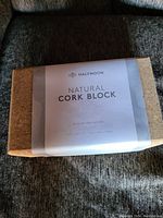 Front view of brand new natural cork block with Halfmoon label showing product name and dimensions.