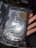 Front view of a Seagate internal hard drive in plastic packaging, showing label and brand information.