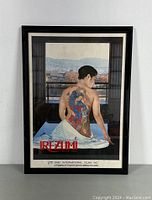 Front view of framed Irezumi 1984 movie poster showing tattooed figure and cityscape background.