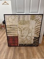 Full view of square canvas showing Buddha face and abstract patterns.