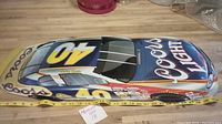 Top view of metal race car tin showing the number 40 and Coors Light logo on the hood and sides.